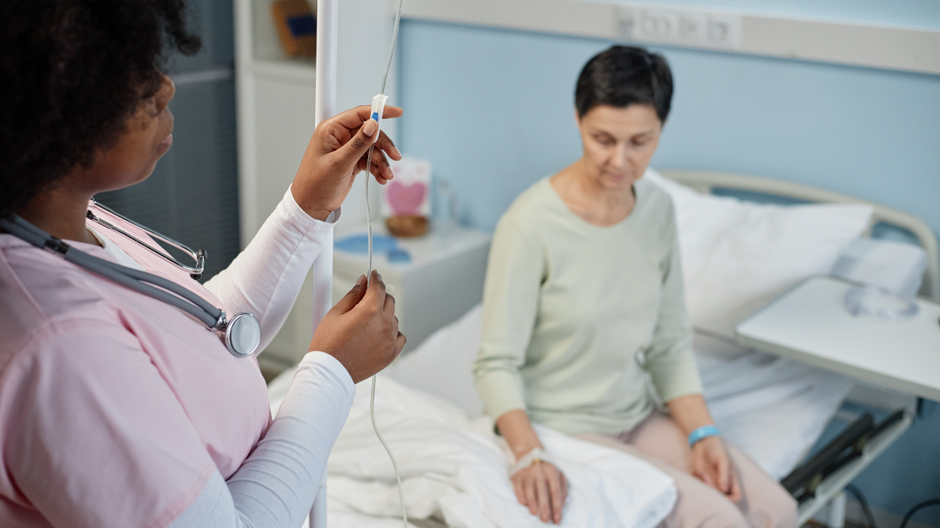 Happy patient relaxing at home in San Antonio in-home IV hydration therapy from Prime Vitality Health