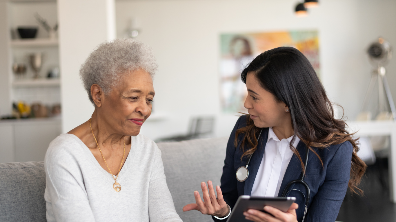 Prime Vitality Health physician providing compassionate support to a hospice patient at a skilled nursing facility in San Antonio, TX