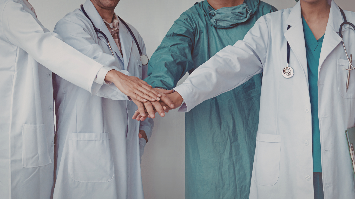 Prime Vitality Health physician rounding with a patient in a skilled nursing facility